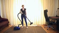 Woman Cleaning Using Vacuum Cleaner Effective Stock Footage Video (100% Royalty-free) 26118242 | Shutterstock