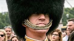 Why British Guards Wear Bearskin Hat Straps Below Their Lip