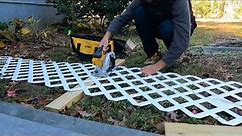 Installing lattice under decking for a beautiful and functional dog fence.
