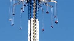 Riders Stuck In The Sky At Amusement Park