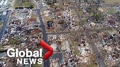 Aerial view shows damage caused by tornadoes, severe storms that killed dozens in multiple US states
