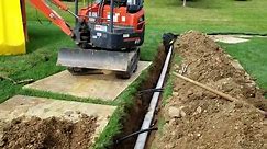 Sump Pump Line to French Drain System to Drain Yard Water - French Drain Systems | Curtain Drains | Macomb, Oakland, Lapeer, St. Clair County