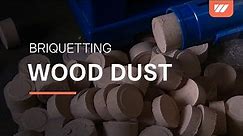 WEIMA briquetting press compacts wood dust into briquettes