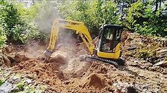 Moving Big Rocks with a 28 hp Mini-excavator