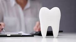 Dentist Paperwork Desk Front Teeth Stock Footage Video (100% Royalty-free) 1098839669 | Shutterstock