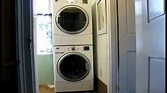 Installing a washer dryer stacking kit