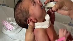 Newborn baby drinking milk