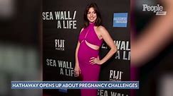 Anne Hathaway Debuts Baby Bump in Fuchsia Pink Cut-Out Dress on Red Carpet at Broadway Opening