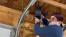 How to Install a Retractable Extension Cord Reel in Your Garage
