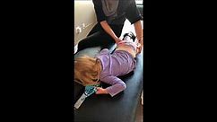 What does it look like to adjust a child with neurological chiropractic?