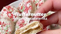 FLUFFERNUTTER WHITE CHOCOLATE RITZ! 🥰🥜 * 56 ritz crackers * 1 cup peanut butter * 1 cup fluff marshmallow * 16oz white chocolate * holiday sprinkles 1. Lay all ritz crackers round side down on baking sheet. 2. To 28 crackers, add 1 tsp peanut butter. To the other 28 crackers, add 1 tsp fluff. Press crackers together so that they are tight but not oozing out. 3. Melt white chocolate at half power in microwave, stirring every 30 seconds. 4. Once melted, dunk cracker sandwiches into chocolate, to