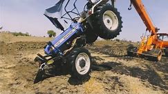 New_Holland_4x4_Tractor_Jumped_in_well_with_2mb_reversible_Plough_rescue_by_hydra