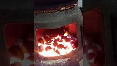 Pot belly stove burning coal