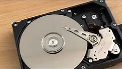 How does a hard drive sounds without a cover? ... not good.