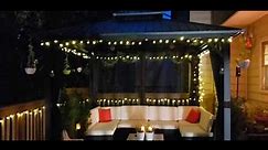 Cozy deck decor with a gazebo and lights