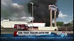 Two trailers catch fire at Lowe's