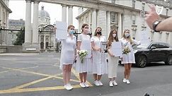 Brides-to-be march to Government Buildings to urge allowance of 100 wedding guests