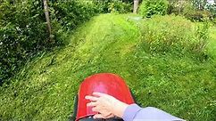 Riding lawn mover tractor - cutting grass with riding mower