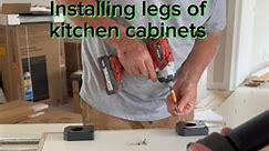 DIY Building kitchen cabinets from kaboodle. We are installing legs. #diy #kitchencabinets #suggestedforyou #RisingStars #FYI #reels #buildingkitchen #tutorials #ownerbuilder #Informative #Informativeealy #foryou | Jiji Healy
