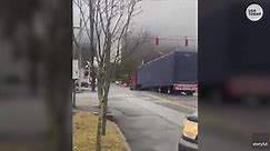Train slams into truck stuck on crossing