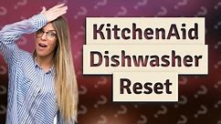How do I reset the control panel on my KitchenAid dishwasher?
