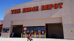 Home Depot sales continue to slide but the biggest home improvement chain still tops expectations