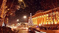 Dynamic static Time-lapse of Tbilisi xmas tree in city center and cars on evening rush hour traffic on xmas holidays