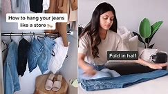 TikTok video show how to fold jeans like a shop and hang them