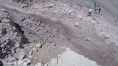 Hikers narrowly avoid being crushed by a massive landslide
