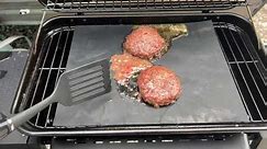 Grilling burgers on my expert grill from Walmart ￼