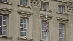 Naked man appears to climb out of Buckingham Palace window