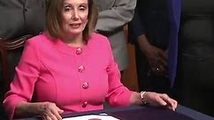 House Speaker Nancy Pelosi signs articles of impeachment