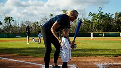 Former pro and Olympic softball gold medalist Jennie Finch works with FMB little leaguers
