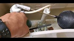 How to Adjust the Ballcock Valve and Water Level in a Toilet Tank