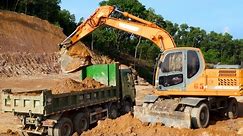 Weighty Wheel Loader Loading Soil On Truck on Construction Site - JCB | Excavator Loading Dump Truck