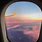 Airplane Window View Sunset
