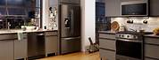 Black Kitchen Cabinets with Stainless Steel Appliances