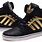 Black and Gold Adidas High Tops
