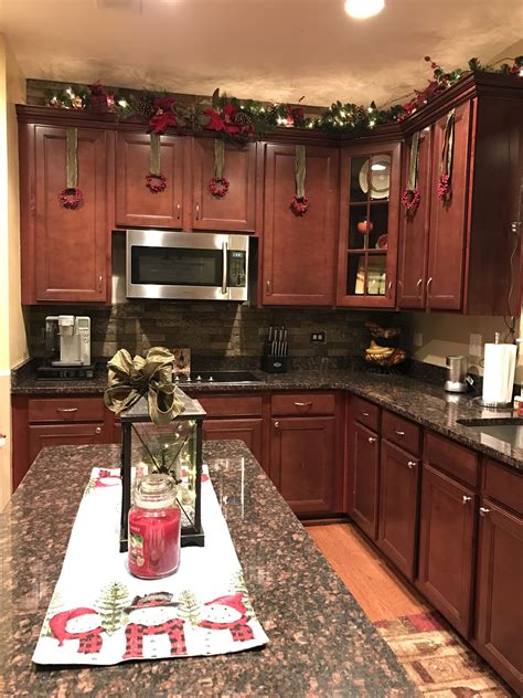 Christmas Decorations above Kitchen Cabinets
