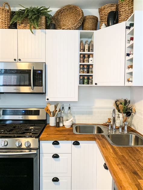 Decorating with Baskets above Kitchen Cabinets