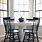 White Farmhouse Table with Black Chairs