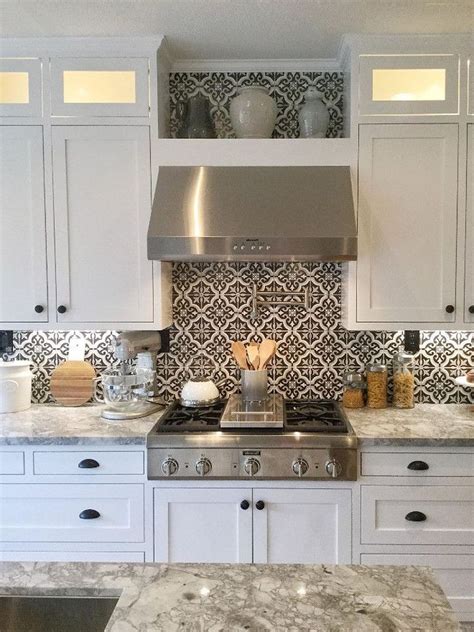 White Kitchen Cabinets with Tin Backsplash