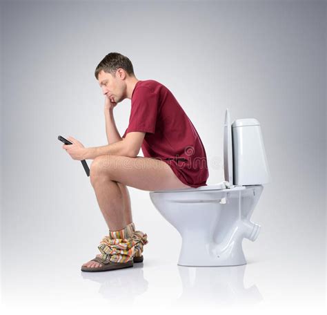 Man Sitting Toilet