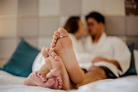 Romantic Couple Feet Bed