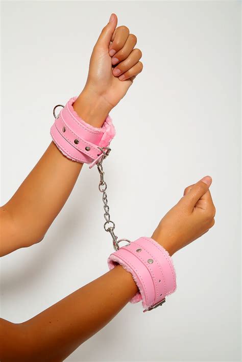 Woman With Pink Handcuffs